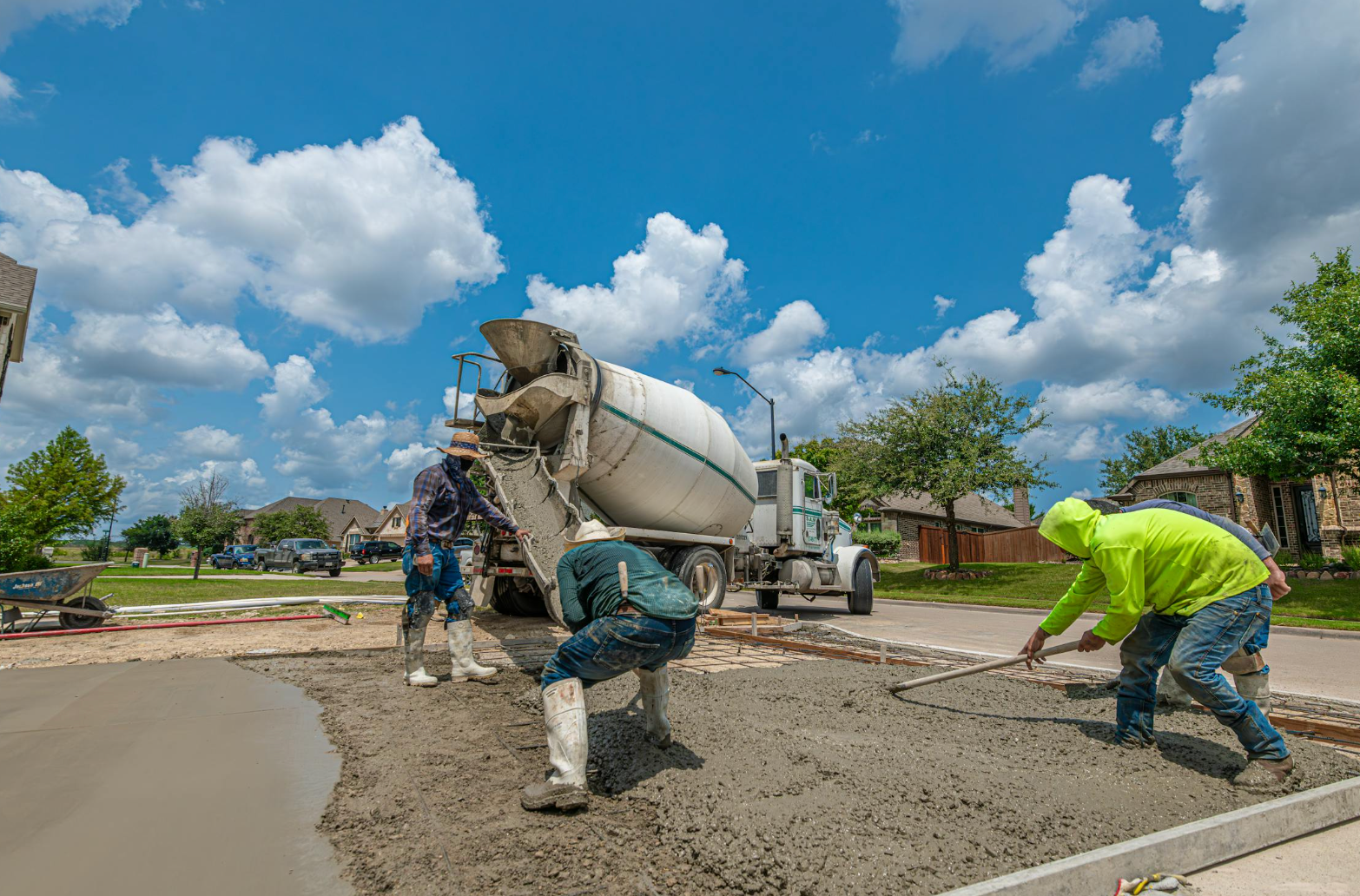 Concrete crew pouring a new residential driveway in Renton WA